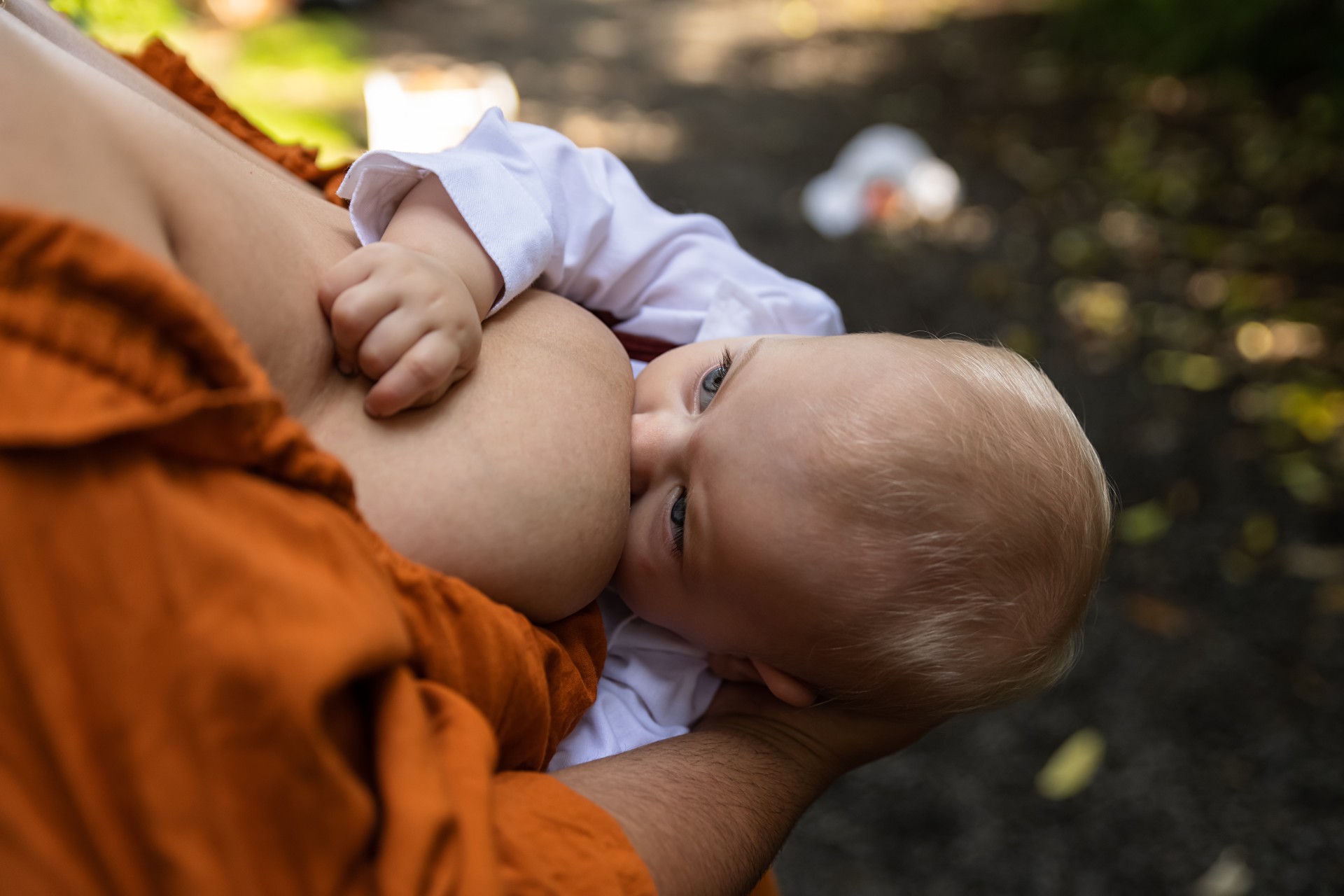 photo of woman breastfeeding