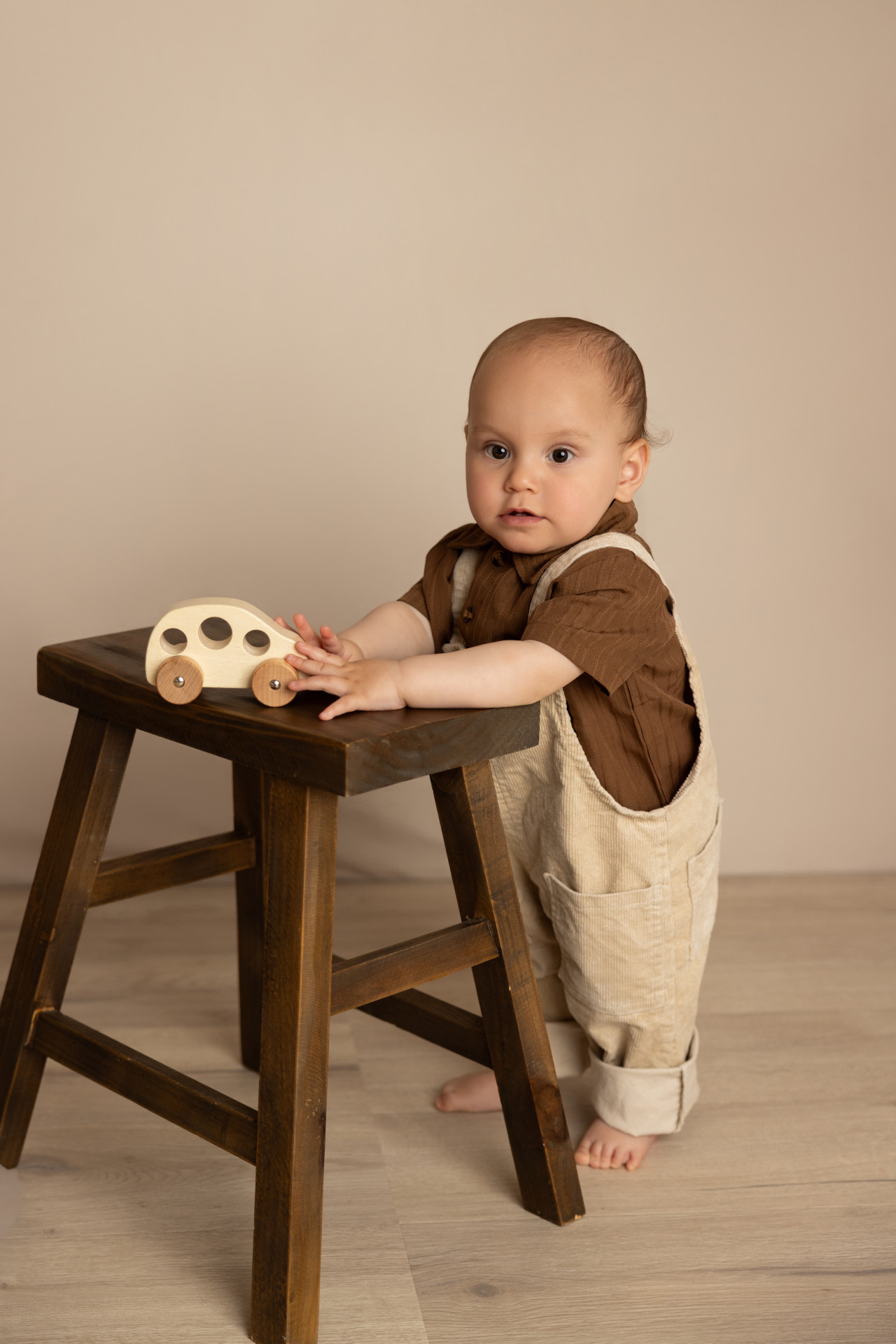 baby playing while standing