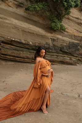 pregnant mum in luxury maternity gown during her maternity session