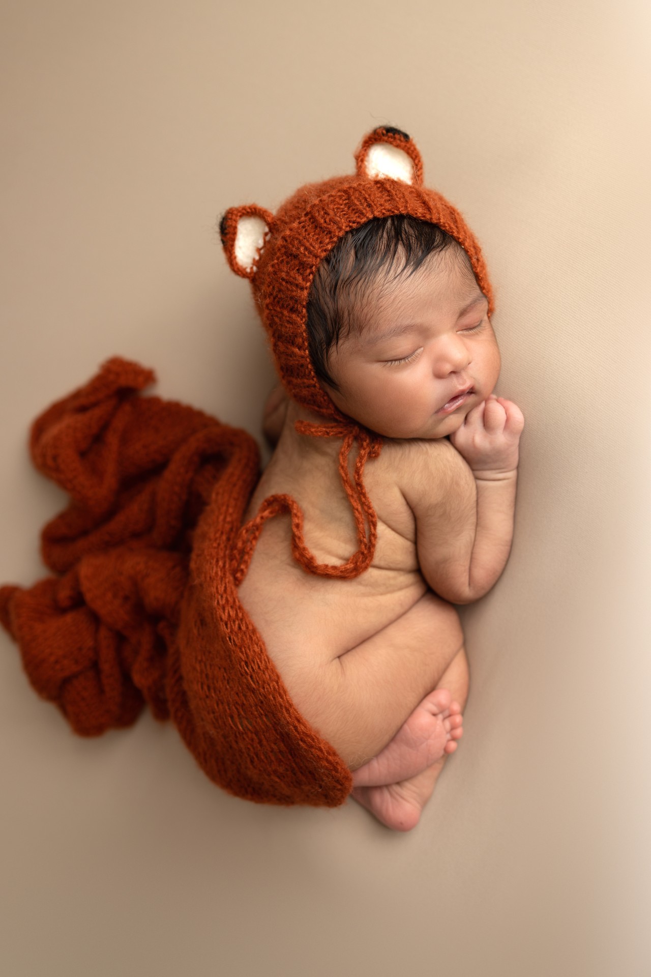 baby in little fox outfit