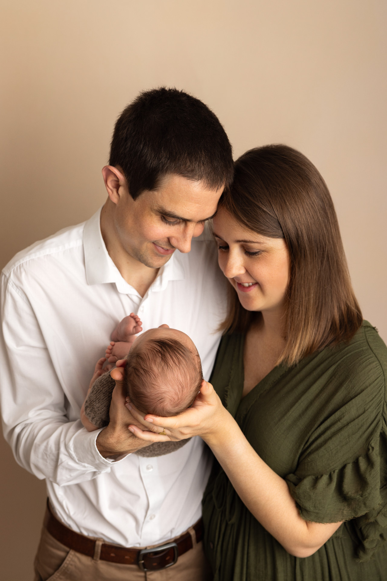 family holding a newborn