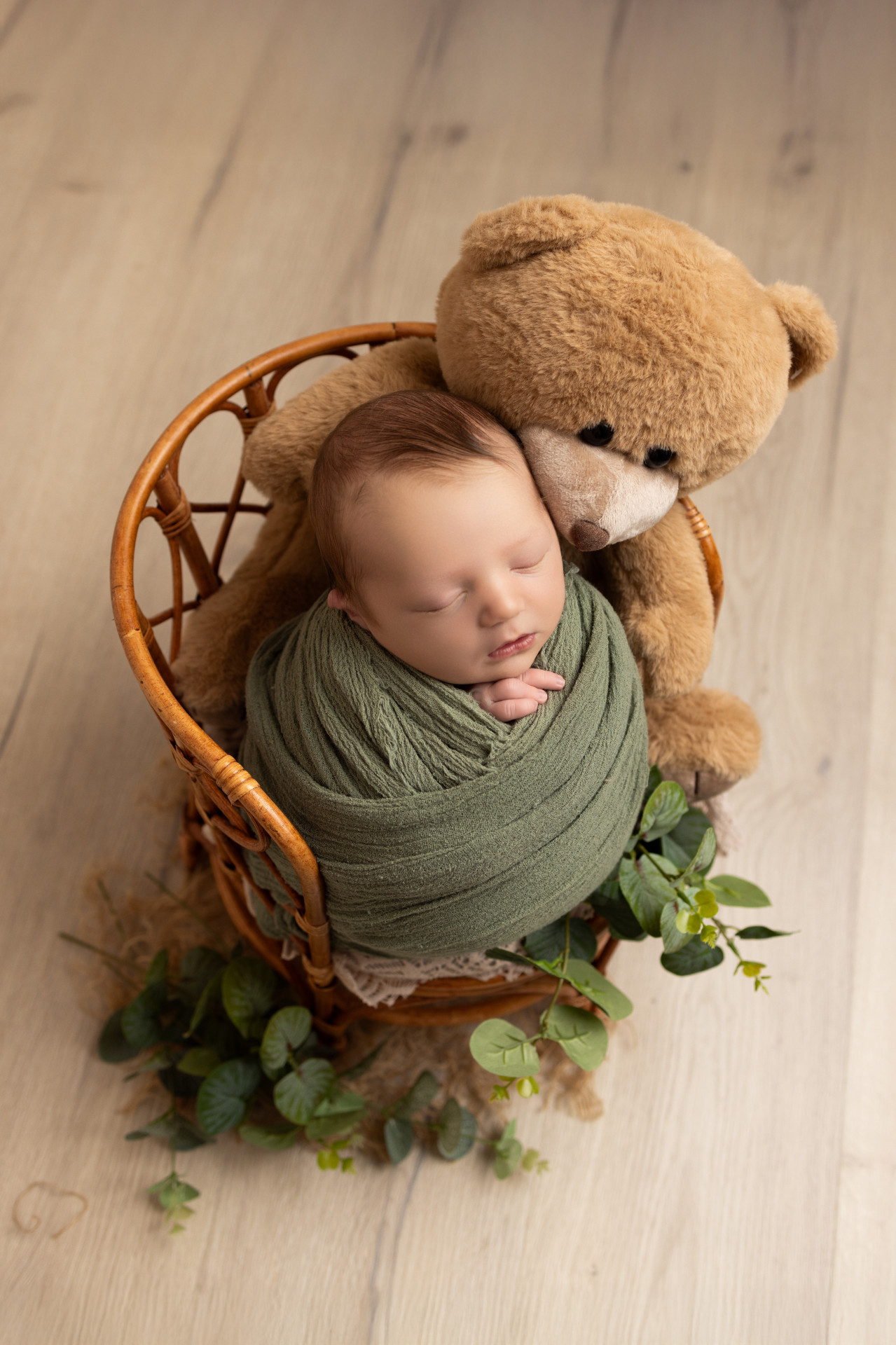 newborn with teddy