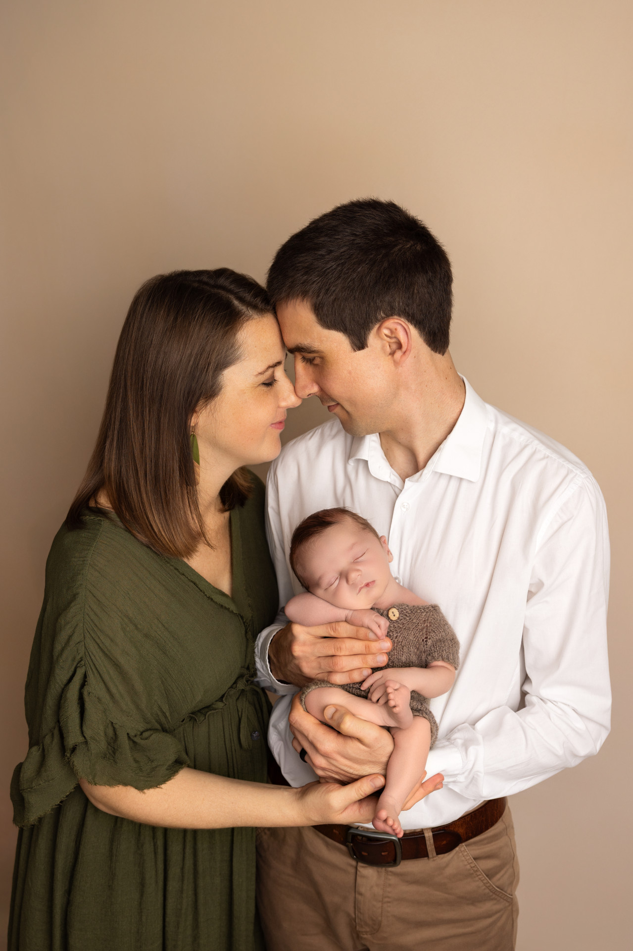 family holding a newborn