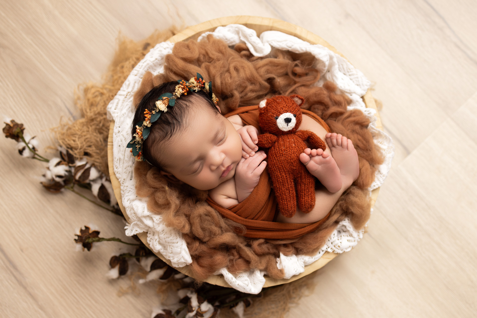 baby in round basket