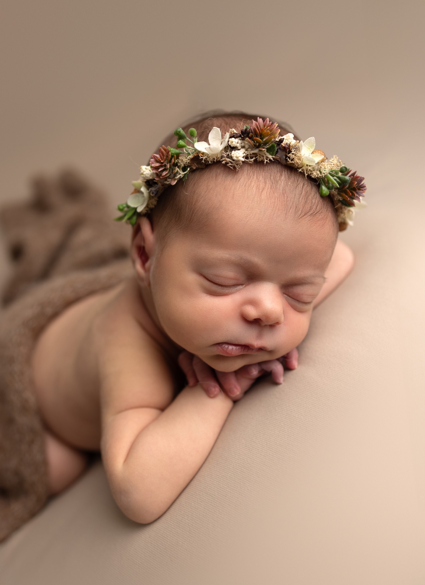baby with a flower crown