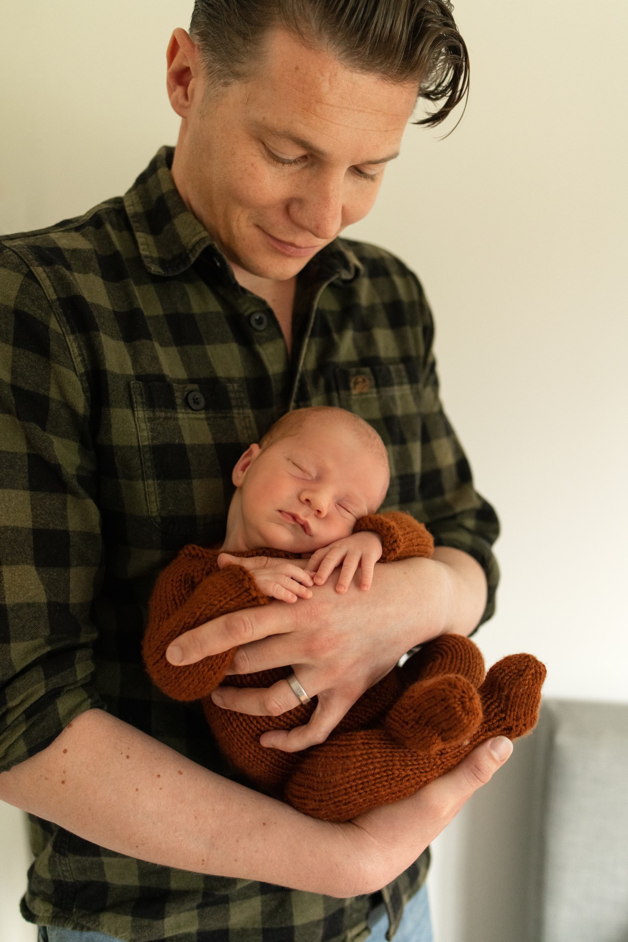 dad holding his newborn son